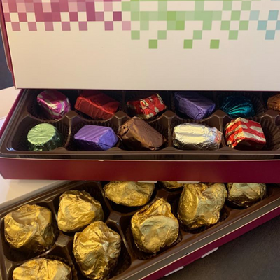 attachment-https://taubys.com/wp-content/uploads/2022/10/Checkered-box-12-Assorted-chocolates-Rs-275.png