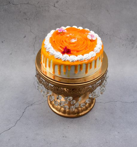 attachment-https://taubys.com/wp-content/uploads/2023/05/Mango-cake_-458x493.jpg